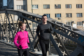 Image showing young  couple jogging