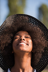 Image showing Close up portrait of a beautiful young african american woman sm