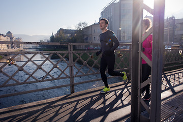 Image showing young  couple jogging