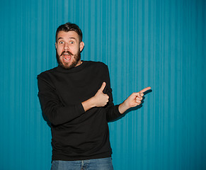 Image showing Portrait of young man with shocked facial expression