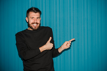 Image showing Portrait of young man with shocked facial expression