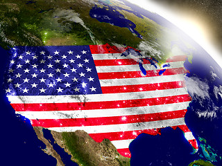 Image showing USA with flag in rising sun