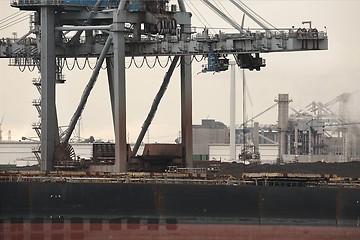 Image showing Unloading a huge ship