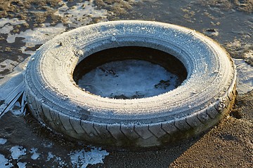 Image showing Abandoned Car Tyre in winter