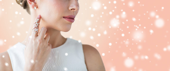 Image showing close up of beautiful woman with ring and earring