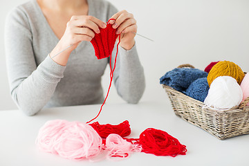 Image showing woman hands knitting with needles and yarn