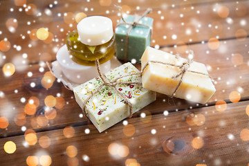 Image showing handmade soap bars on wood