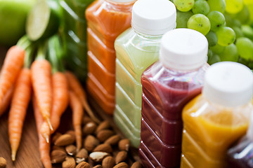 Image showing bottles with different fruit or vegetable juices