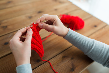 Image showing woman hands knitting with needles and yarn