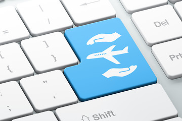 Image showing Insurance concept: Airplane And Palm on computer keyboard background