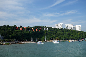 Image showing Pattaya bay with commerical boats and the Pattaya City sign