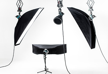 Image showing Empty photo studio with lighting equipment