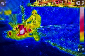 Image showing Infrared Thermal image worker cutting grass in city park