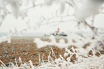 Image showing Small cemetery amid frozen landscape