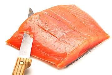 Image showing Salmon slicing with knife