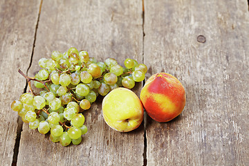 Image showing Fruits on wooden table