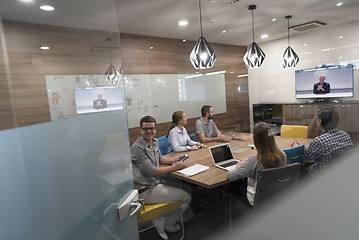 Image showing start up business people group attending videoconference call