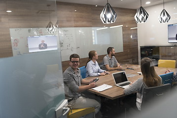 Image showing start up business people group attending videoconference call