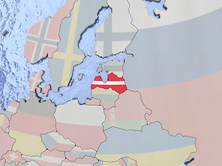 Image showing Latvia with flag on globe