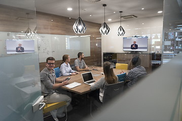 Image showing start up business people group attending videoconference call