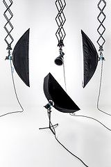 Image showing Empty photo studio with lighting equipment