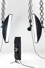 Image showing Empty photo studio with lighting equipment