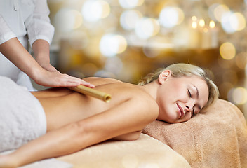 Image showing close up of woman lying and having massage in spa