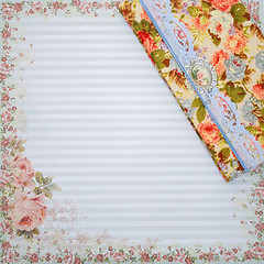 Image showing Scrapbooking holder for travel documents on floral paper