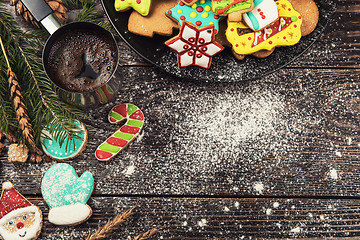 Image showing Gingerbreads and coffee for new years or christmas