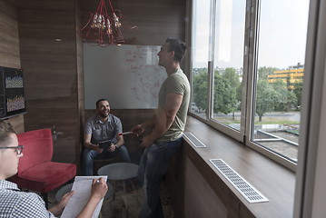 Image showing team meeting and brainstorming in small private office