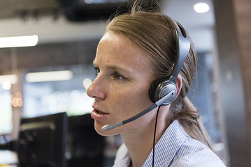 Image showing female support phone operator