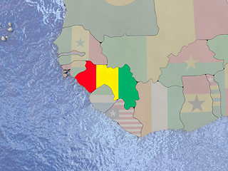 Image showing Guinea with flag on globe