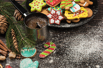 Image showing Gingerbreads and coffee for new years or christmas