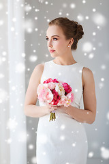 Image showing bride or woman in white dress with flower bunch