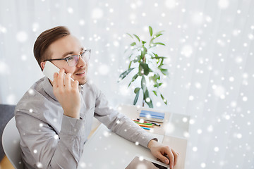 Image showing happy creative male worker calling on smarphone