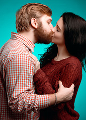 Image showing Young man and woman kissing