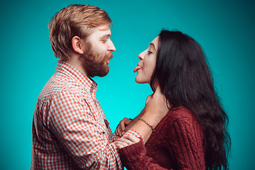 Image showing The embrace of young man and woman