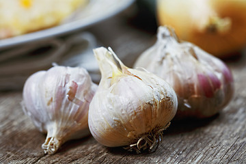 Image showing Garlic on wooden table