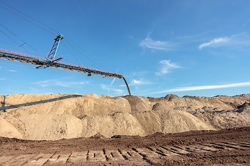 Image showing Large excavator machine in the mine