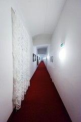 Image showing Blank wall and long walkway