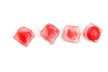 Image showing Four strawberries in ice
