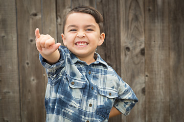 Image showing Young Mixed Race Boy Making Shaka Hand Gesture