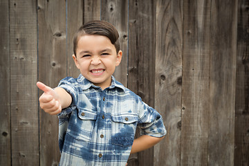 Image showing Young Mixed Race Boy Making Hand Gestures