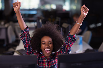 Image showing young black woman at her workplace in modern office  African-Ame