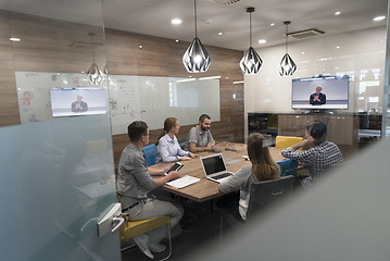 Image showing start up business people group attending videoconference call