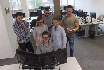 Image showing group of young startup business people standing as team