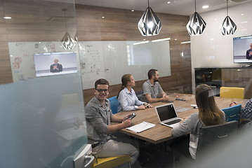 Image showing start up business people group attending videoconference call