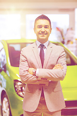 Image showing happy man at auto show or car salon