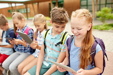 Image showing group of happy elementary school students talking