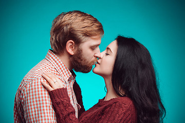 Image showing Young man and woman kissing